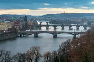 What's New: Bridges over Vltava River against sky seen from Letna park at twilight, Prague, Bohemia