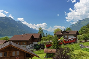 Chalets Prints: Brienz Rothorn train passing traditional chalets, Brienz, Bernese Oberland, Switzerland