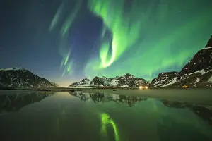 Flakstad Prints: Bright night sky with Aurora Borealis (Northern Lights) over mountains and Skagsanden beach