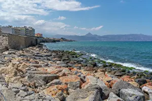 Footpath Prints: Bright sunny day along the coastline near Heraklion