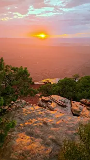 Canyonlands Prints: Bright sunset seen over the canyon landscape from Grand View Point in Canyonlands National Park