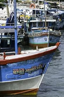 Search Results: Brightly coloured fishing boat at Negombo lagoon, Negombo, Sri Lanka, Asia