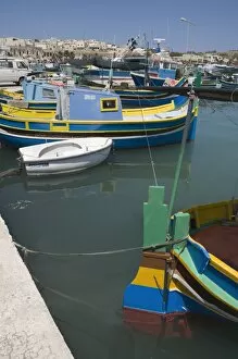 Images Dated 7th June 2008: Brightly coloured fishing boats called Luzzus at the fishing village of Marsaxlokk
