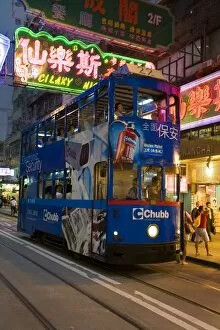 Images Dated 31st October 2007: Brightly coloured trams running between Central and Wan Chai, Wan Chai