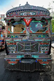 Sights Prints: Brightly decorated bus at Empress Market in Karachi