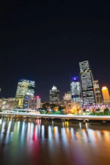 Queens Land Prints: Brisbane skyline at night reflected in Brisbane River