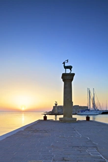 Bronze Doe and Stag statues at the entrance to Mandraki Harbour, Rhodes, Dodecanese