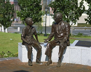 Louisiana Prints: Bronze man and boy statue, Woldenberg Riverfront Park, New Orleans, Louisiana