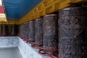 Meditation Prints: Bronze prayer wheels at Songzanlin Monastery in Shangri-La City represent Buddhist devotion