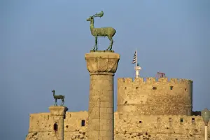 Rhodes Prints: Bronze stag and doe statues, entrance to Mandraki Harbour, Rhodes Town