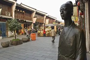 Hangzhou Prints: A bronze statue in Qinghefang Old Street in Wushan district of Hangzhou