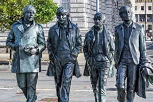 Sidewalk Prints: Bronze statues of the four members of a famous band