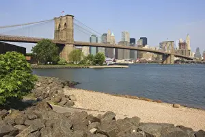 Brooklyn Bridge spanning the East River and Lower Manhattan skyline, from Empire-Fulton Ferry State Park, Brooklyn, New York City, New York, United States of America
