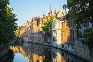Spires Prints: Brugse Vrije and buildings along the Groenerei canal at dawn