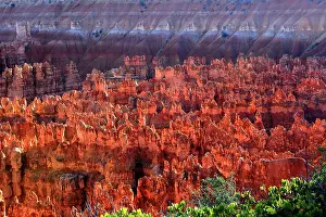 West Prints: Bryce Canyon exhibits rock formations and colorful landscape along the Utah terrain in the early morning light