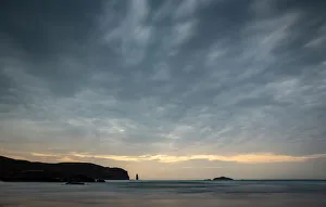 Am Buachaille sea stack at sunset, Sandwood Bay, Sutherland, Scotland, United Kingdom