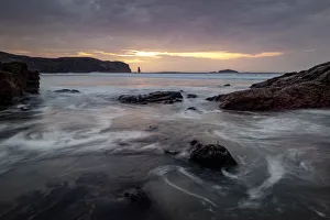 Am Buachaille sea stack at sunset, Sandwood Bay, Sutherland, Scotland, United Kingdom