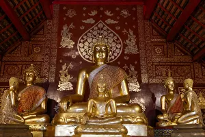 Red Colour Prints: Buddha and disciple statues in Wat Pan Ping, Chiang Mai, Thailand, Southeast Asia, Asia