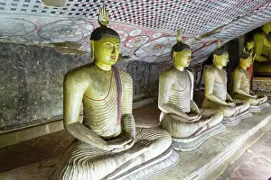 Folded Prints: Buddha figures inside Dambulla cave Buddhist temple complex