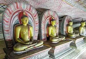Buddha figures inside Dambulla cave Buddhist temple complex, UNESCO World Heritage Site, Sri Lanka, Asia