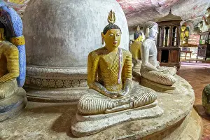 Ancient Site Prints: Buddha figures inside Dambulla cave Buddhist temple complex