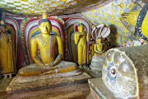 Religious Site Prints: Buddha figures inside Dambulla cave Buddhist temple complex