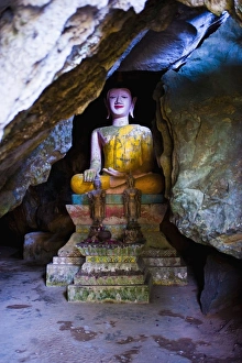 Typically Prints: Buddha hidden in the Tham Sang Caves, Vang Vieng, Laos, Indochina, Southeast Asia, Asia