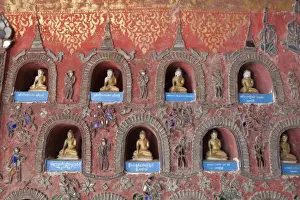Buddha offerings in wall niche, Shwe Yan Pyay monastery, Nyaungshwe, Inle Lake, Shan State, Myanmar (Burma), Asia