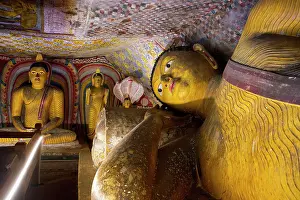 Meditation Prints: Buddha statues and murals inside Dambulla Cave Temple in Sri Lanka capture rich cultural history and artistry