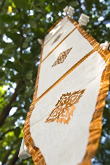 Crest Prints: Buddhist flag in temple trees, Chiang Mai, Thailand, Southeast Asia, Asia