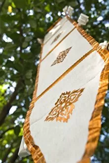 Buddhist flag in temple trees, Chiang Mai, Thailand, Southeast Asia, Asia