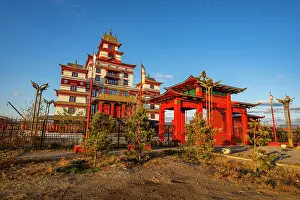 Meditation Prints: Buddhist monastery with red architecture and blue sky in Kyzyl, Republic of Tuva, Russia