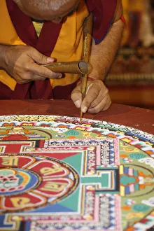 Artist Prints: Buddhist monk drawing a mandala, Paris, Ile de France, France, Europe