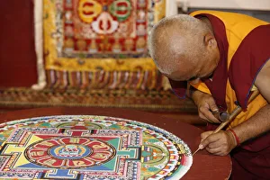 Artist Prints: Buddhist monk drawing a mandala, Paris, Ile de France, France, Europe