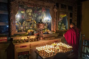 Monk Prints: A Buddhist monk praying in the Bati temple, Gansu, China, Asia