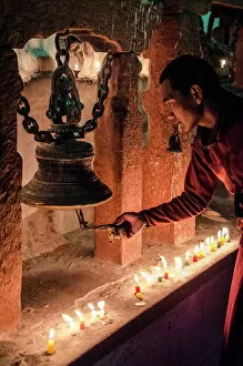 Head And Shoulders Gallery: A Buddhist monk rings a prayer bell during the full moon celebrations, Bodhnath stupa, Bodhnath