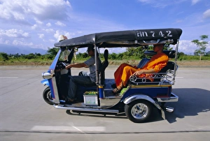 Shades Prints: Buddhist monk in a tuk tuk taxi