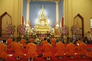 Buddhist monks praying