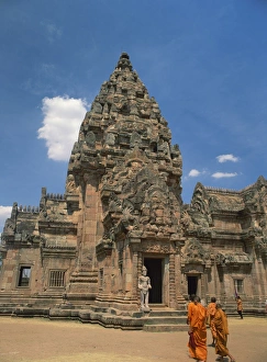 Buddhist monks in saffron robes in the central sanctuary