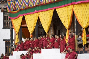 Tsechu Prints: Buddhist monks watching festival (Tsechu), Trashi Chhoe Dzong, Thimphu, Bhutan, Asia