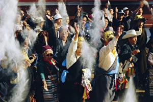 New Year Prints: Buddhist people throwing flour into the air