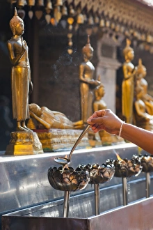 Incense Prints: Buddhist person praying, Wat Doi Suthep Temple, Chiang Mai, Thailand, Southeast Asia, Asia