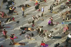 Meditating Prints: Buddhist pilgrims prostrating, Barkhor Jokhang Temple, Lhasa, Tibet, China