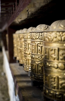 Gold Colour Prints: Buddhist prayer wheels, Namche Gompa (Monastery)