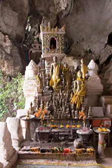 Large Group Of Objects Prints: Buddhist shrine, Pak Ou Buddha Caves