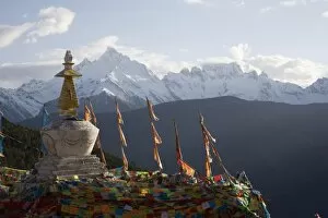 Images Dated 30th April 2008: Buddhist stupa on way to Deqin, on the Tibetan Border, with the Meili Snow Mountain peak in the background