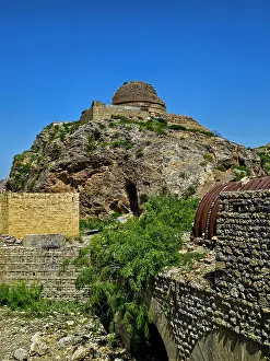 Meditation Prints: Buddhist stupas at Khyber Pass display ancient architecture and history beneath clear sky in Pakistan