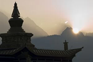 Images Dated 10th January 2000: Buddhist temple at dawn with mountains beyond, Snow mountain, Tagong Grasslands