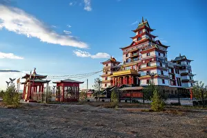 Meditation Prints: Buddhist temple stands in Kyzyl under blue skies and natural surroundings in the Republic of Tuva