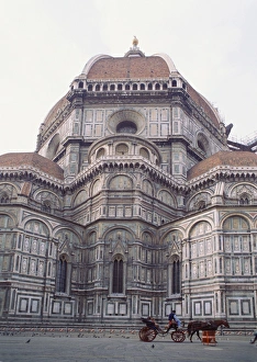 Buggy in front of the Duomo, Florence, UNESCO World Heritage Site, Tuscany, Italy, Europe Buggy in front of the Duomo, Florence, UNESCO World Heritage Site, Tuscany, Italy, Europe